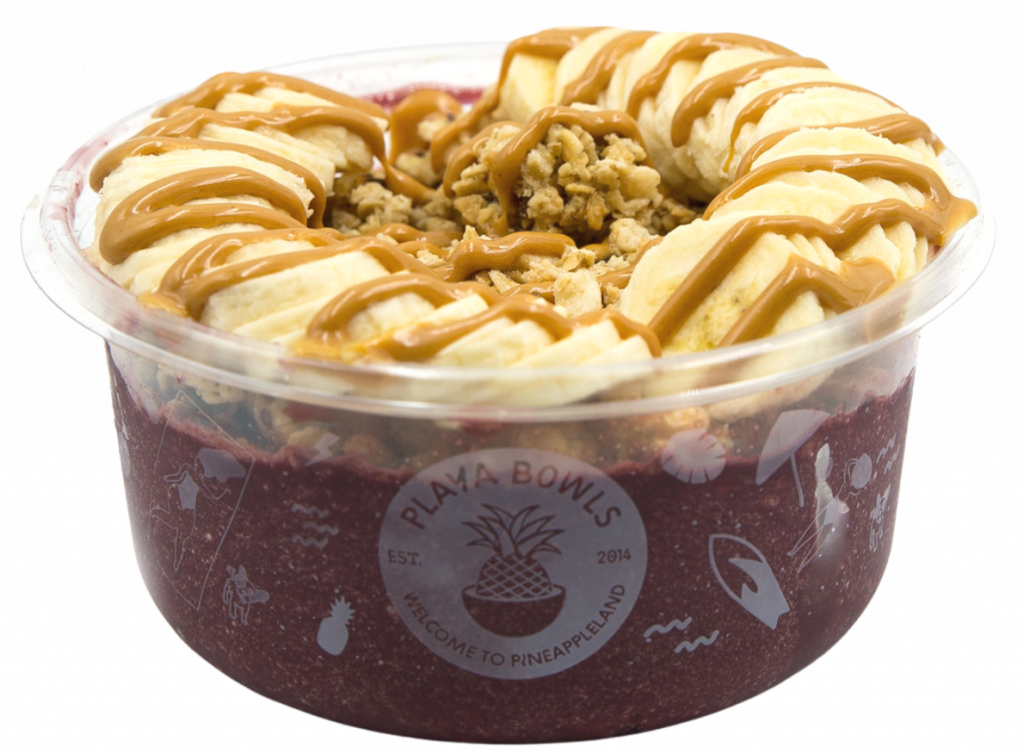 Pure acai with chocolate protein topped with granola, banana, peanut butter