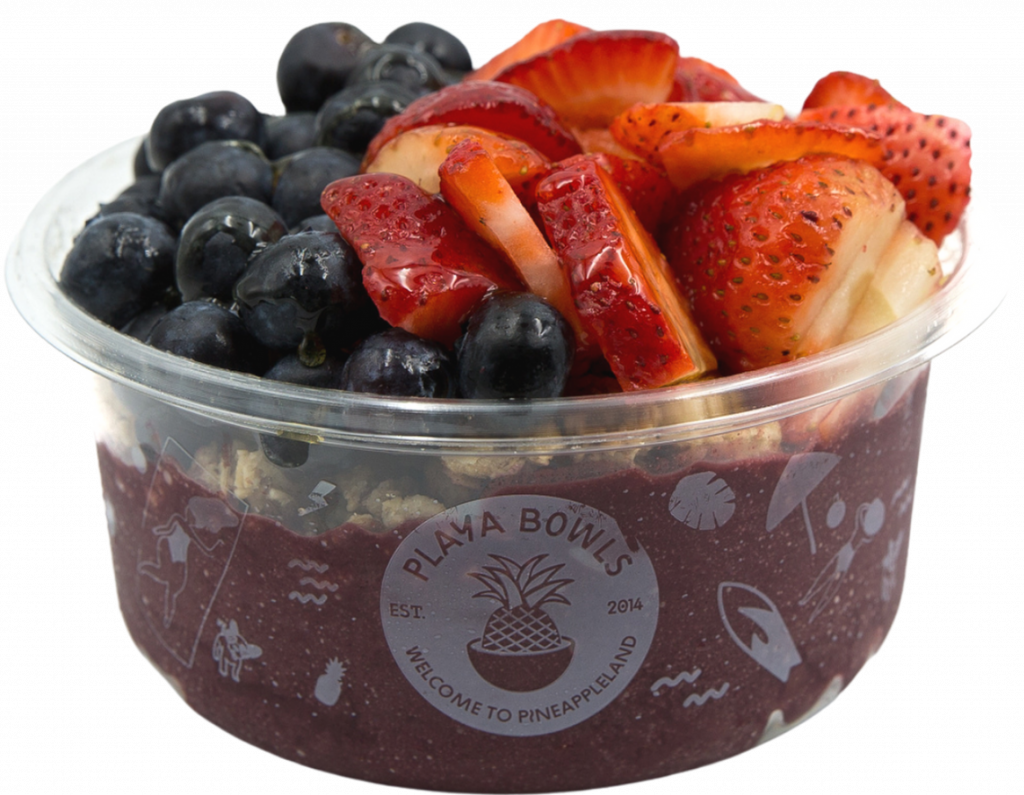 Pure acai topped with granola, blueberry, strawberry, honey